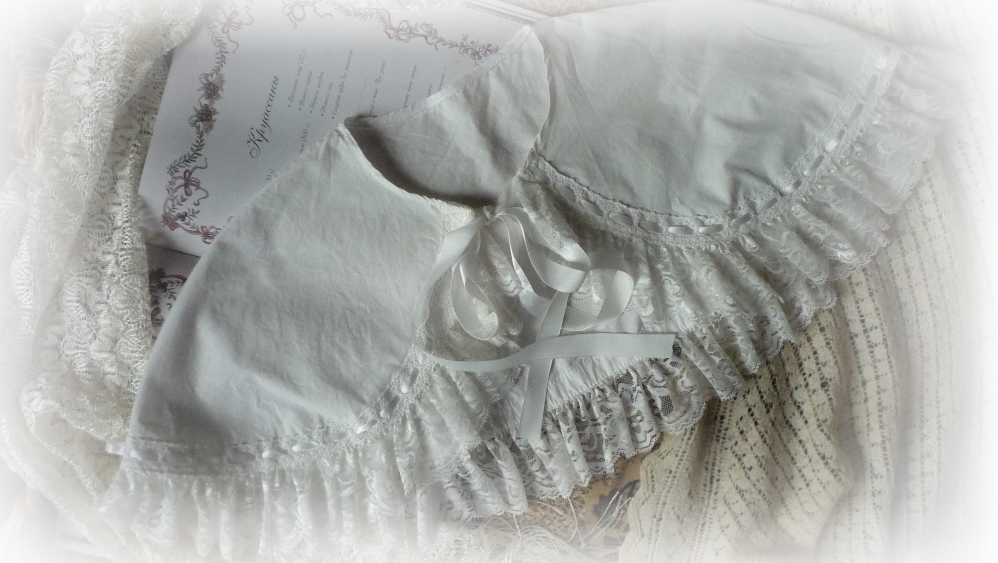 white cotton cape.